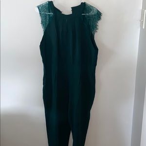 Women’s dark green romper, long pant.